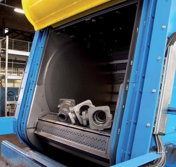 Castings inside a tumble blast machine